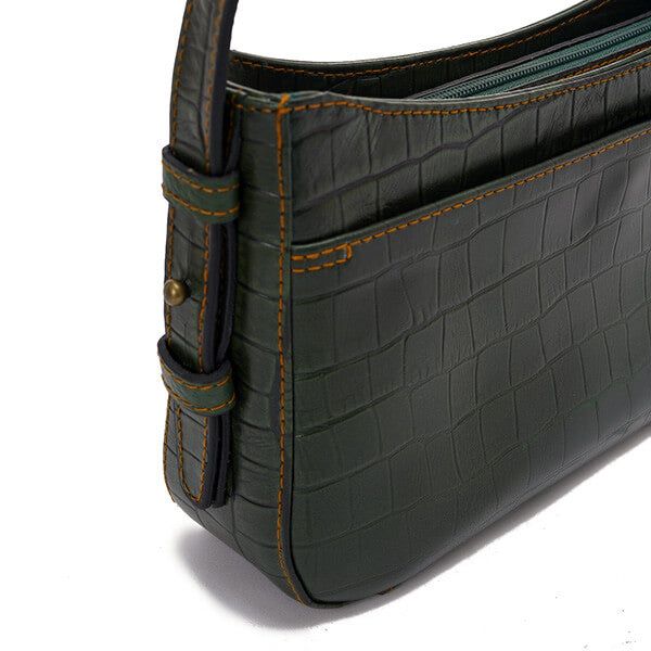 حقيبة كتف جلدية مطبوعة باللون الأخضر